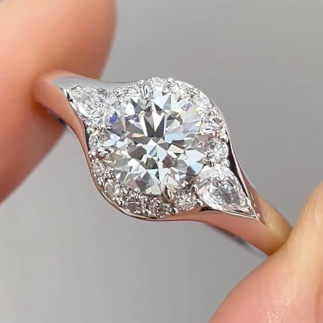 Three-Stone Lab Diamond Ring – Round Center with Marquise Side Stones and Pavé Halo — product photo 3 of 6
